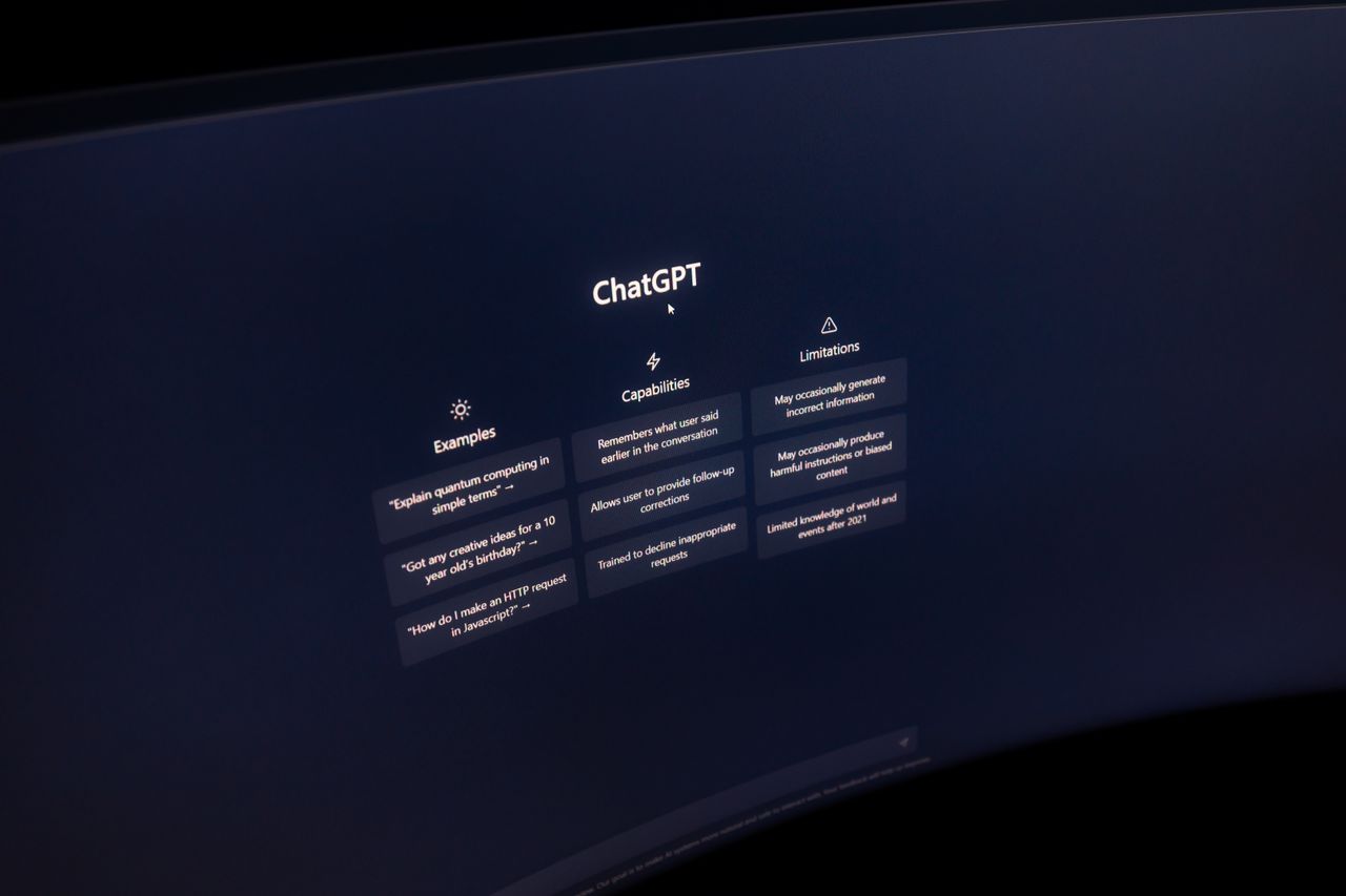 heros-img Close-up of a computer screen displaying ChatGPT interface in a dark setting.